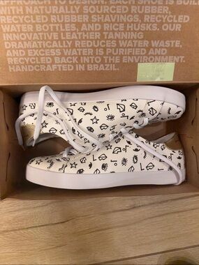 OTBT White Low-Top Sneakers with Black Graphic Print and Gold Heel Tab